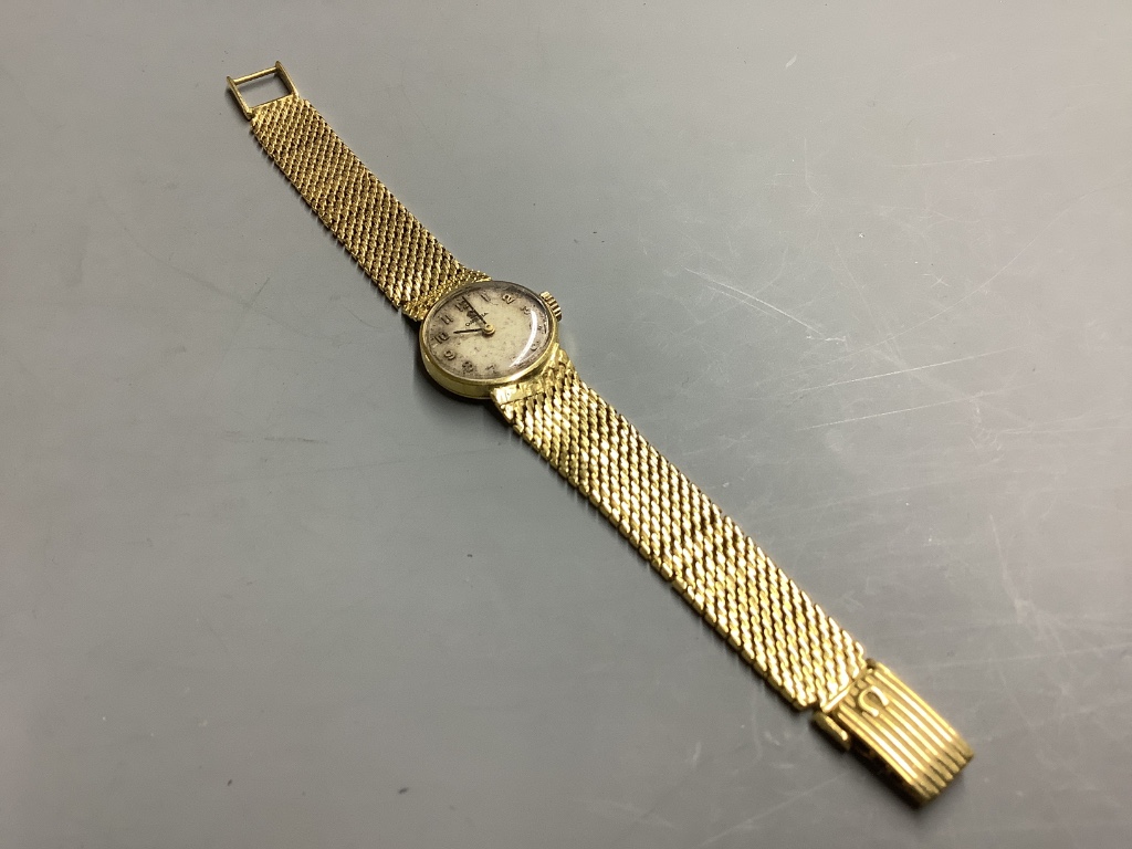 A vintage ladies' Omega 18ct gold ladys' wristwatch on integral mesh bracelet, total 28.7g